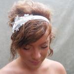 Ivory Bridal Headband With Pearl Embellishments..